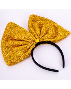 Diadema plástica con lazo detalle brillante dorado