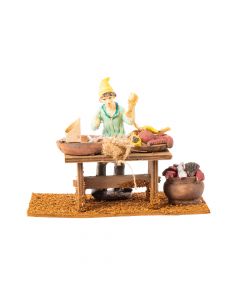 Figura poliresina aldeano vendedor 14.5x9x11cm
