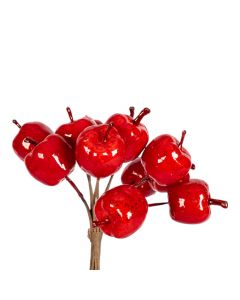 Rama artificial navideña con fruto rojo