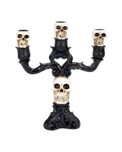 Candelabro con calaveras y relieve