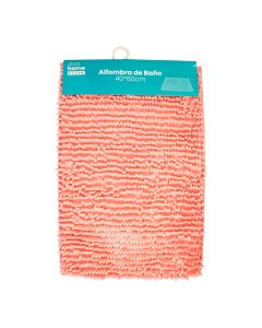 Alfombra rosada para baño