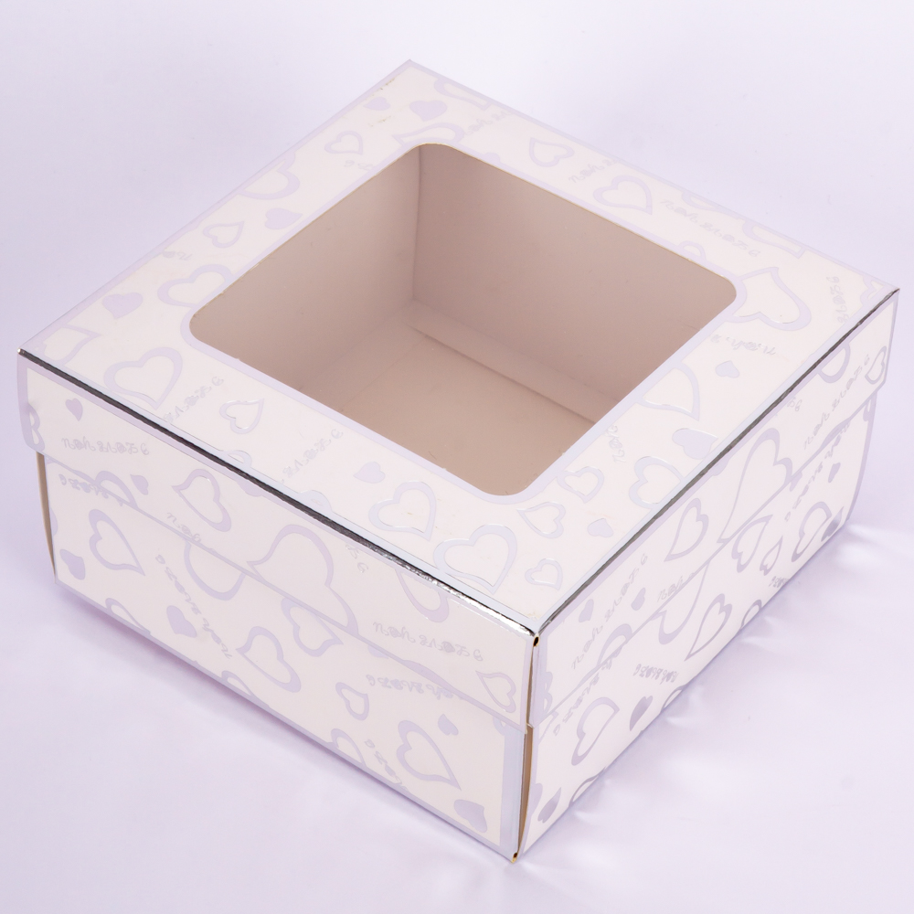 Caja cartón estampado corazón con ventana 12.5x12.5x6.5cm surtido