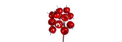 Rama artificial navideña con fruto rojo