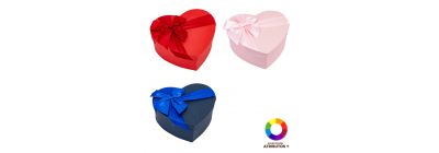 Caja corazón con lazo rojo